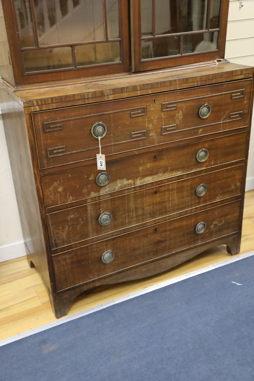 A Regency mahogany secretaire bookcase, width 106cm depth 51cm height 230cm